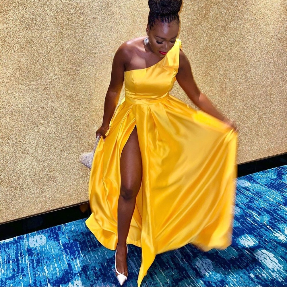 Yellow satin long Evening gown with split. Bow detail on shoulder. Worn once.